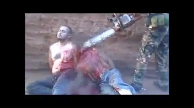 2 Guys 1 Chainsaw The Mexican Chainsaw Beheading (No Watermark And Better Quality)
